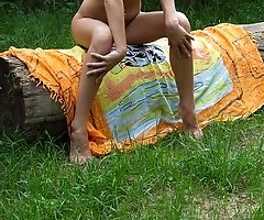 Blonde nudist hot posing on picnic