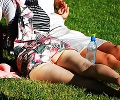 Upskirting and sunbathing in park